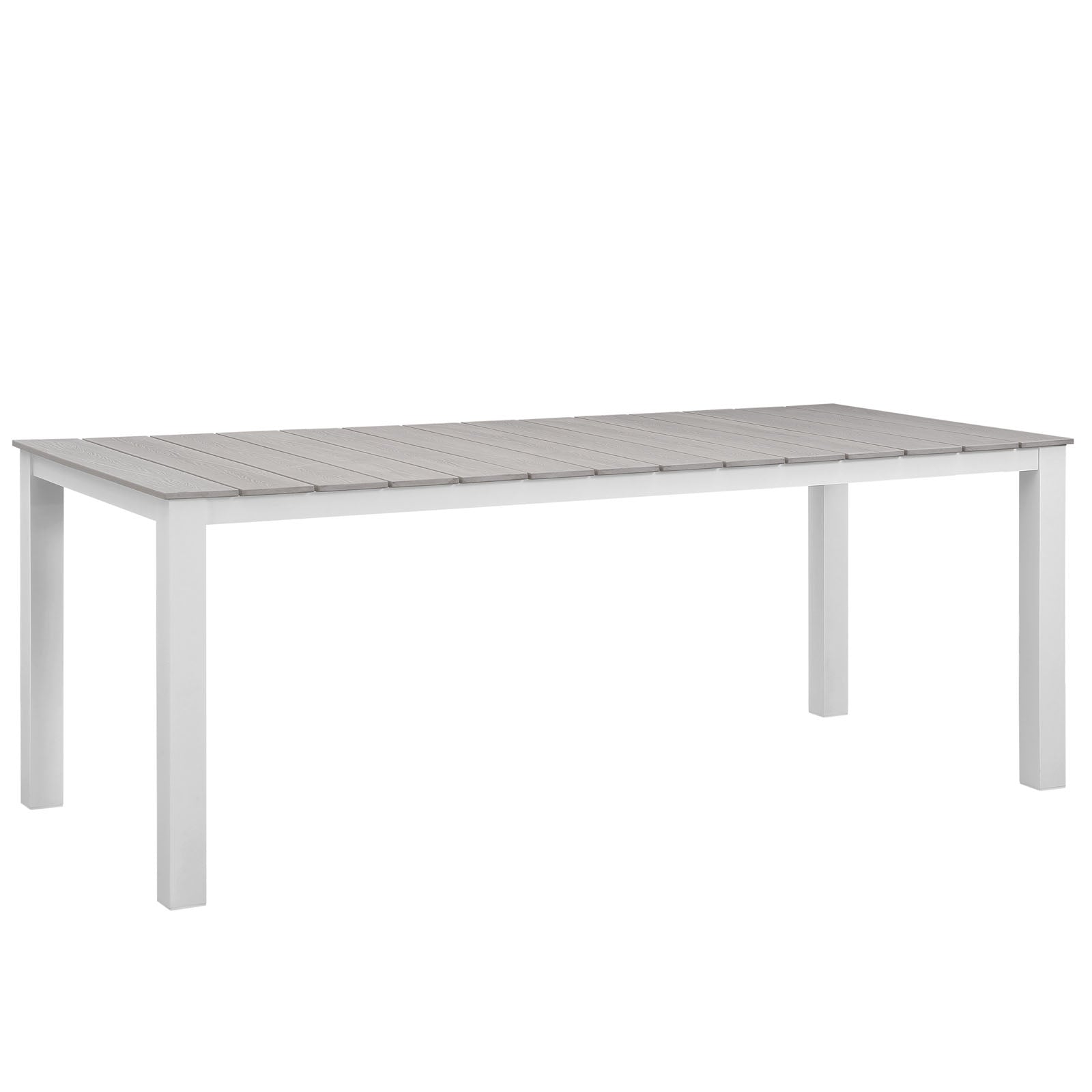 Rectangular outdoor dining table with gray slatted top and white legs; part of a 7-piece outdoor dining set.