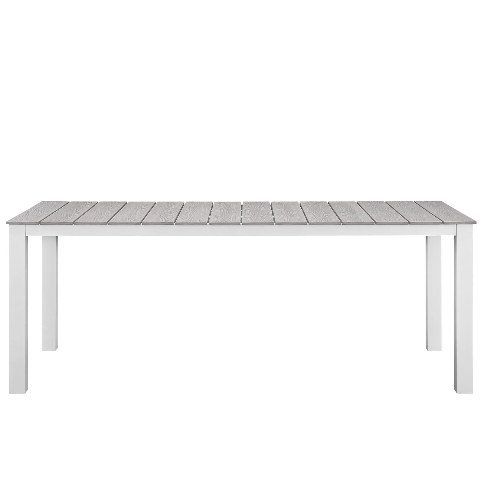 Long rectangular outdoor table with gray slatted wooden top and white legs.