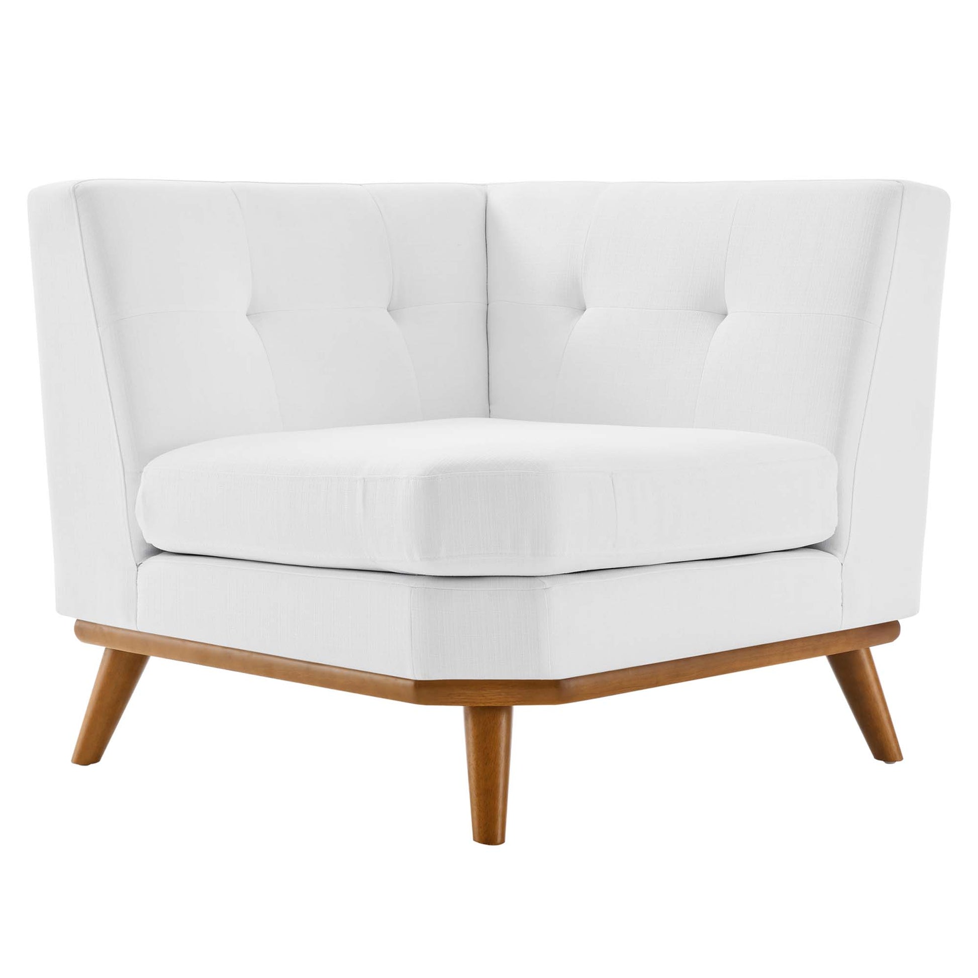 White fabric corner chair with tufted back, rounded seat cushion, and mid-century wooden legs.