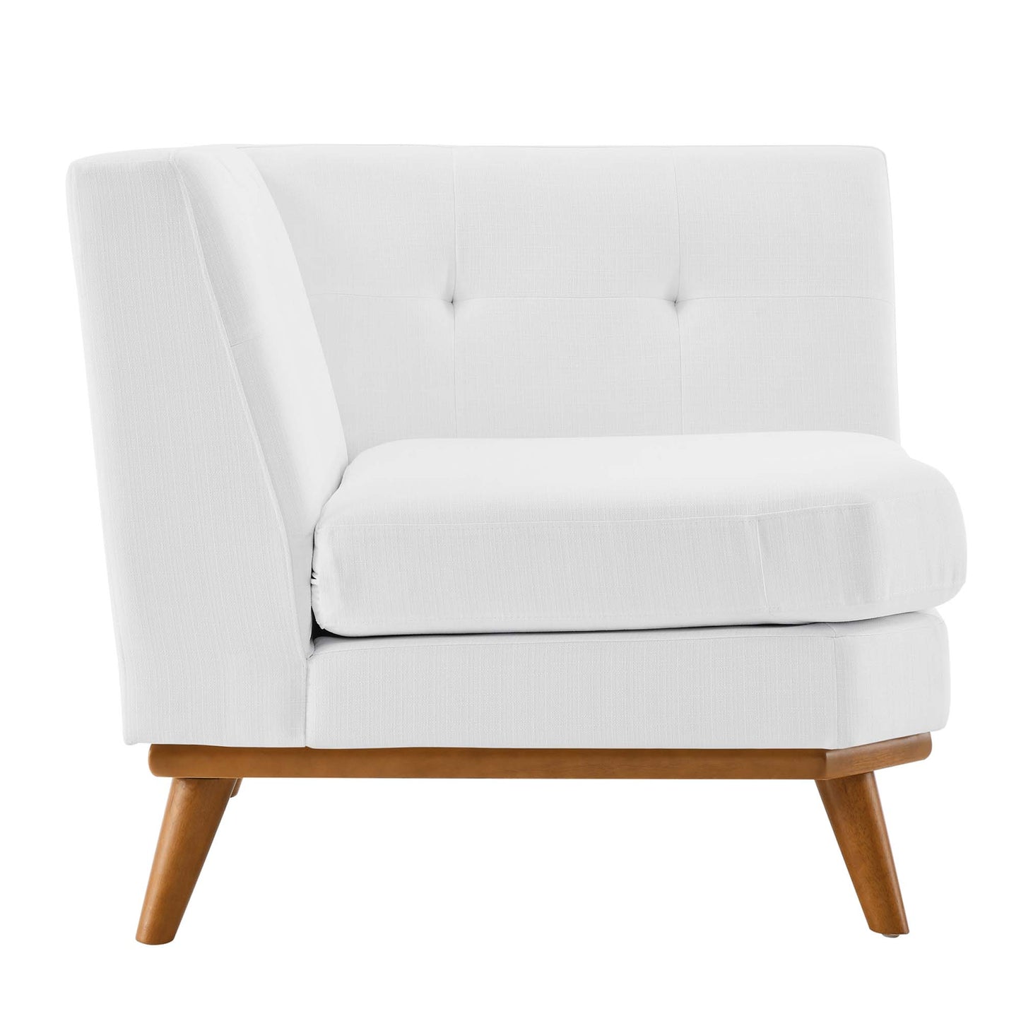 White fabric upholstered mid-century style corner chair with tufted back, thick cushioned seat, and angled wooden legs