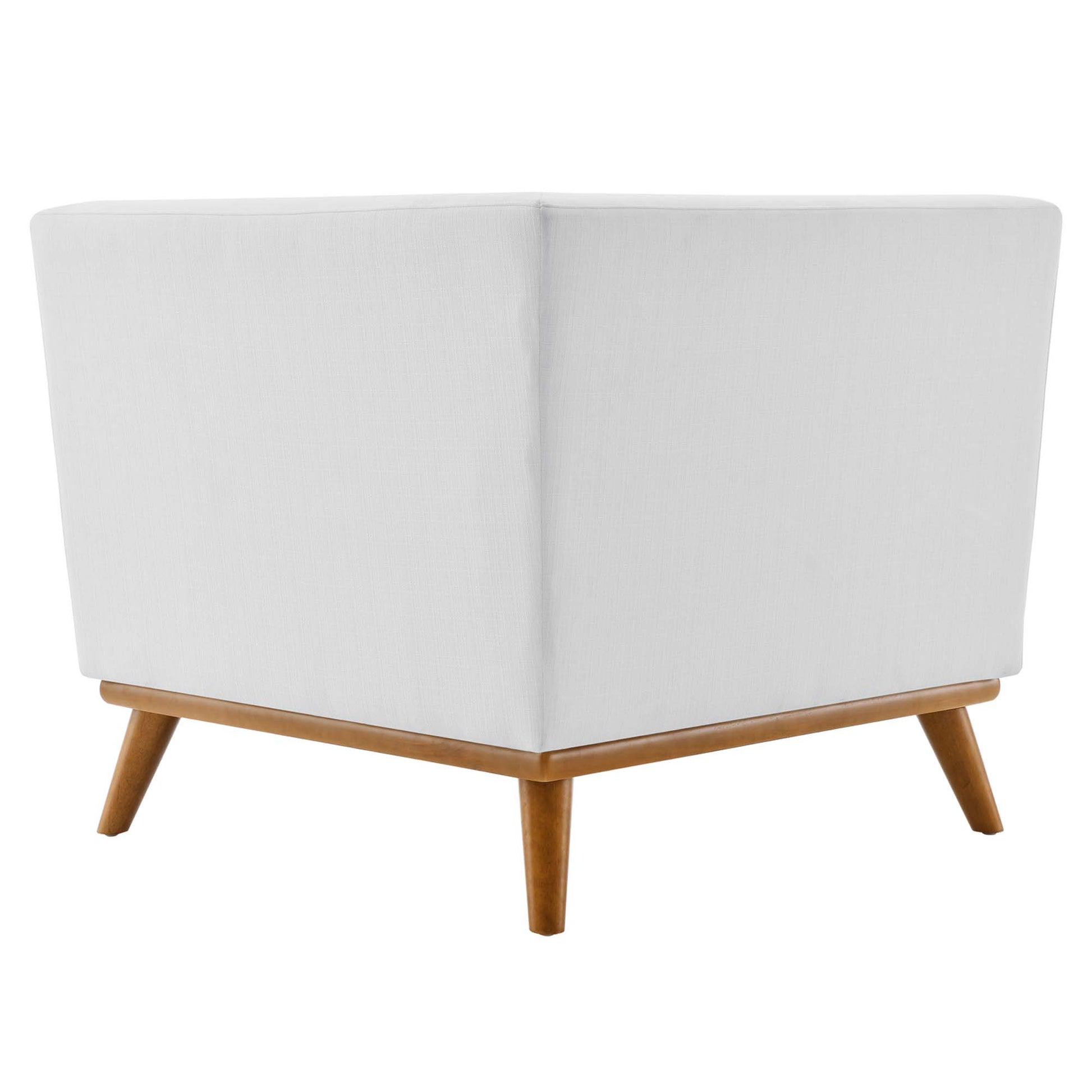White fabric upholstered corner chair with light wood frame & angled legs, mid-century modern style.