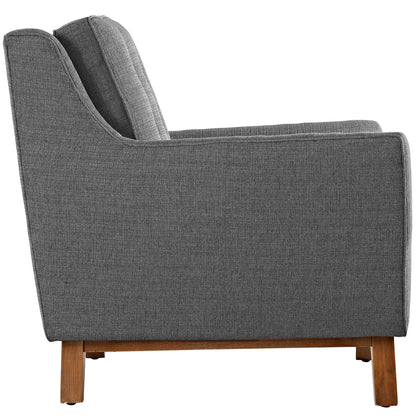 Gray fabric upholstered loveseat with wooden legs, cushioned back and seat, mid-century modern style.