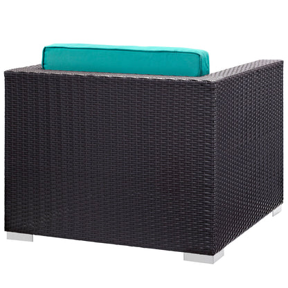 Espresso wicker outdoor 5-piece sectional set with turquoise cushions and metal legs; boxy modern patio seating.