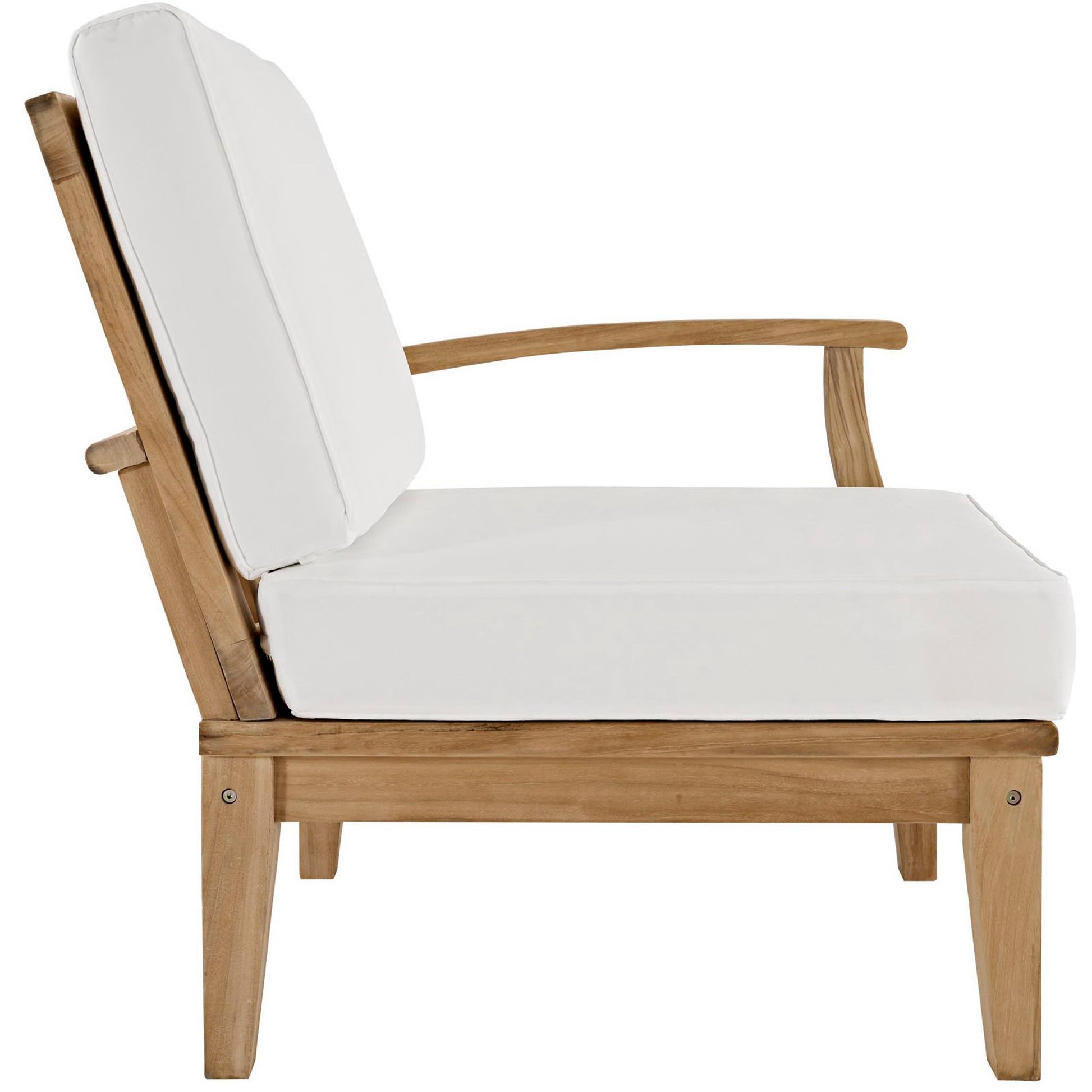 Natural wood patio chair with white cushions on the seat and back, curved armrests.
