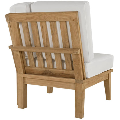 Natural wood outdoor armchair with white cushions, slatted back and solid square legs.