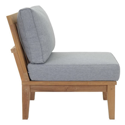 Natural wood lounge chair with light gray fabric cushions, backrest and seat, shown from the side.