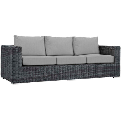 Dark gray woven rattan outdoor sofa with light gray cushions, three-seat modern lounge.