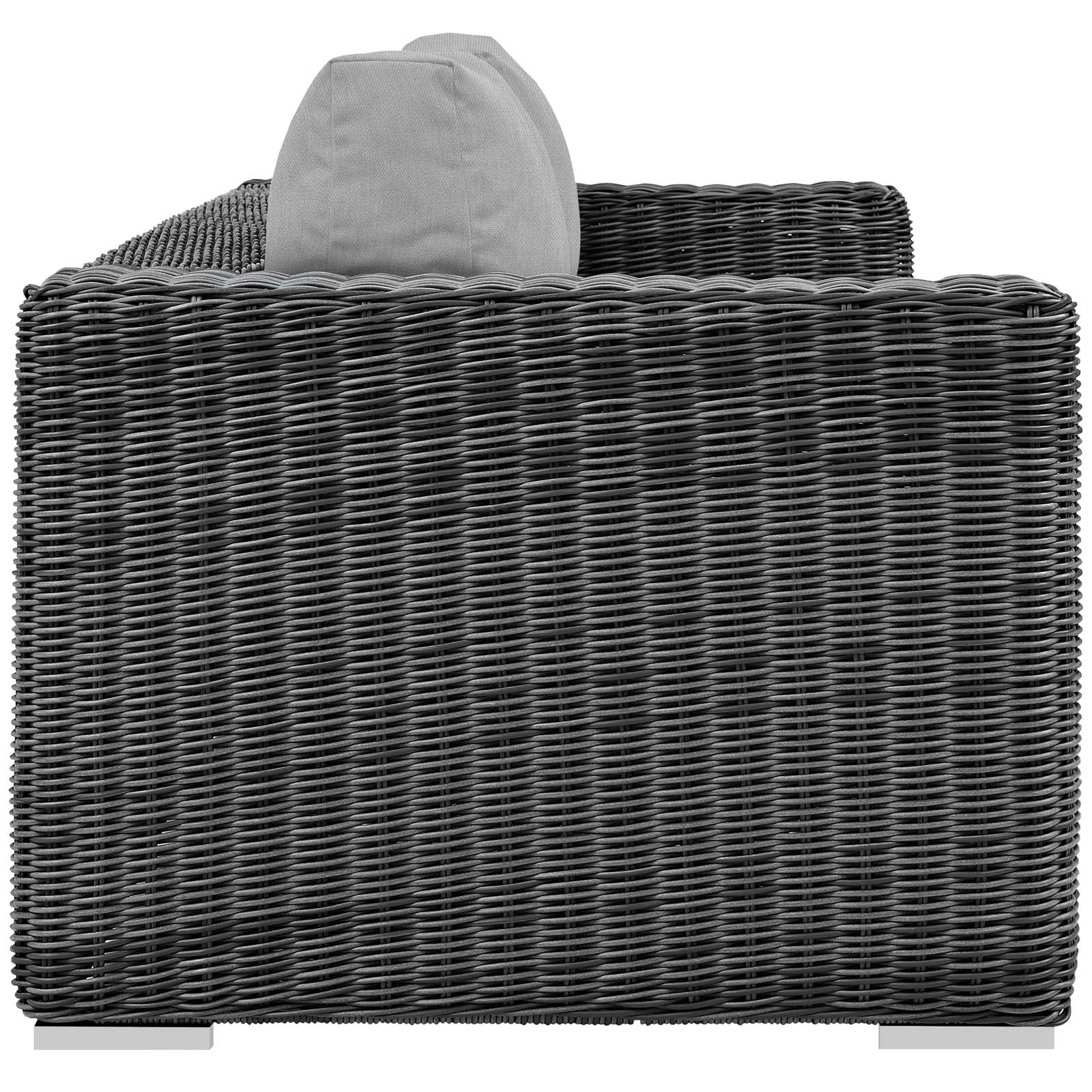 Dark gray woven rattan outdoor sofa with a light gray backrest cushion; modern patio seating.