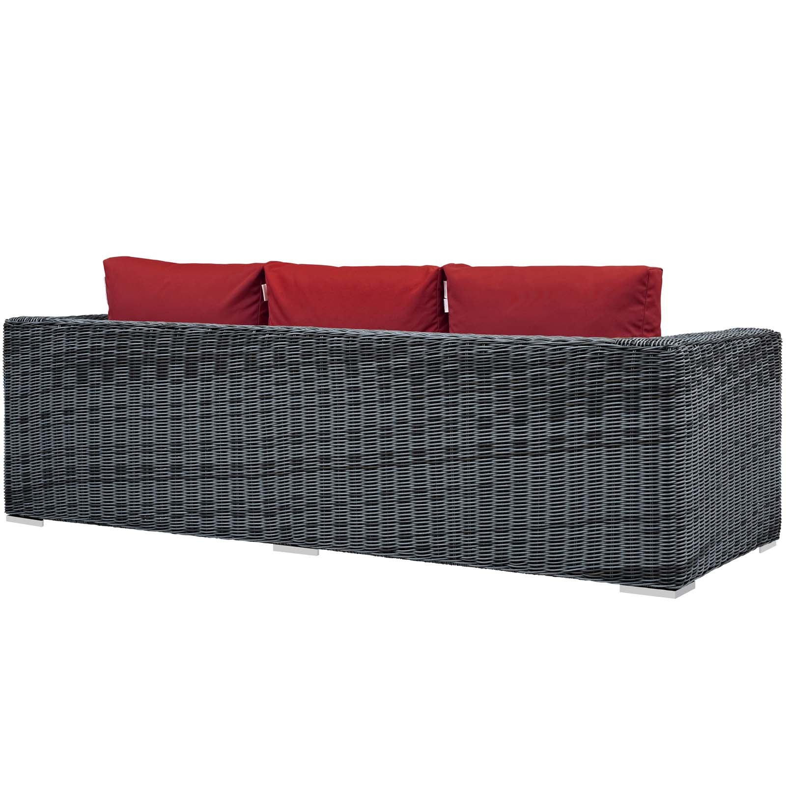 Grey wicker outdoor sofa with red cushions, modern patio seating, rectangular low-profile frame.