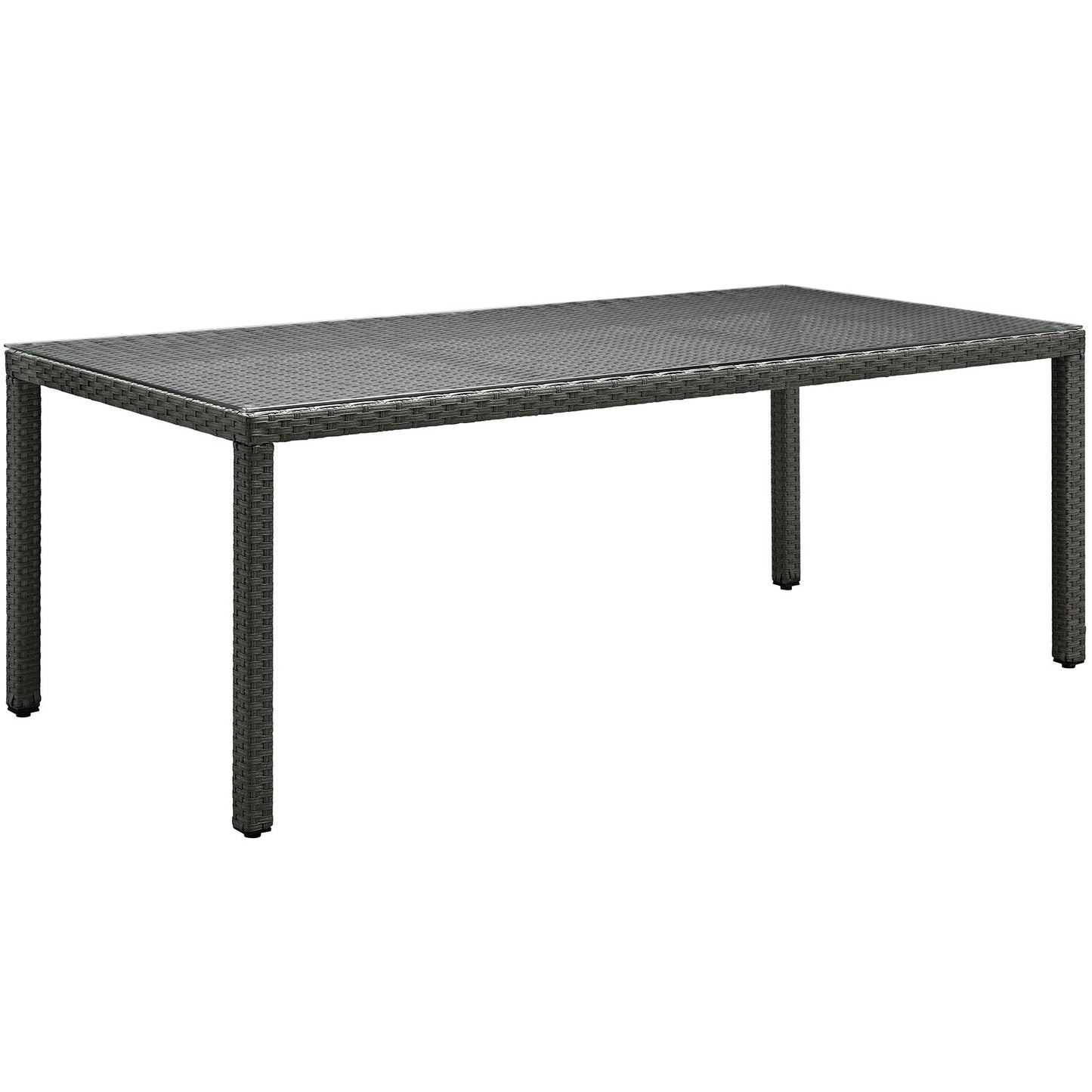 Rectangular dark brown wicker outdoor dining table with woven top and four sturdy legs.