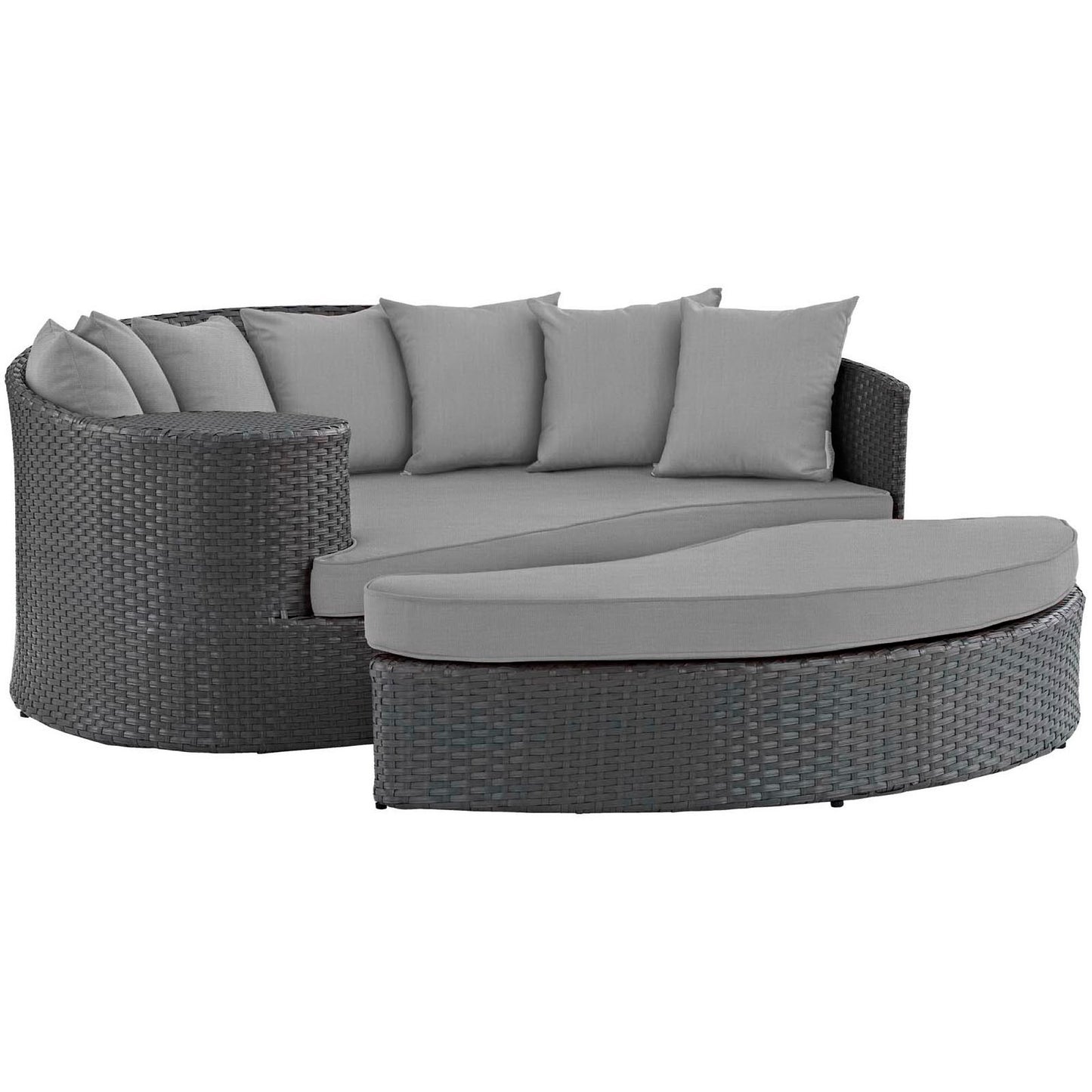 Dark gray outdoor daybed with curved back and light gray cushions, plus a matching curved ottoman.