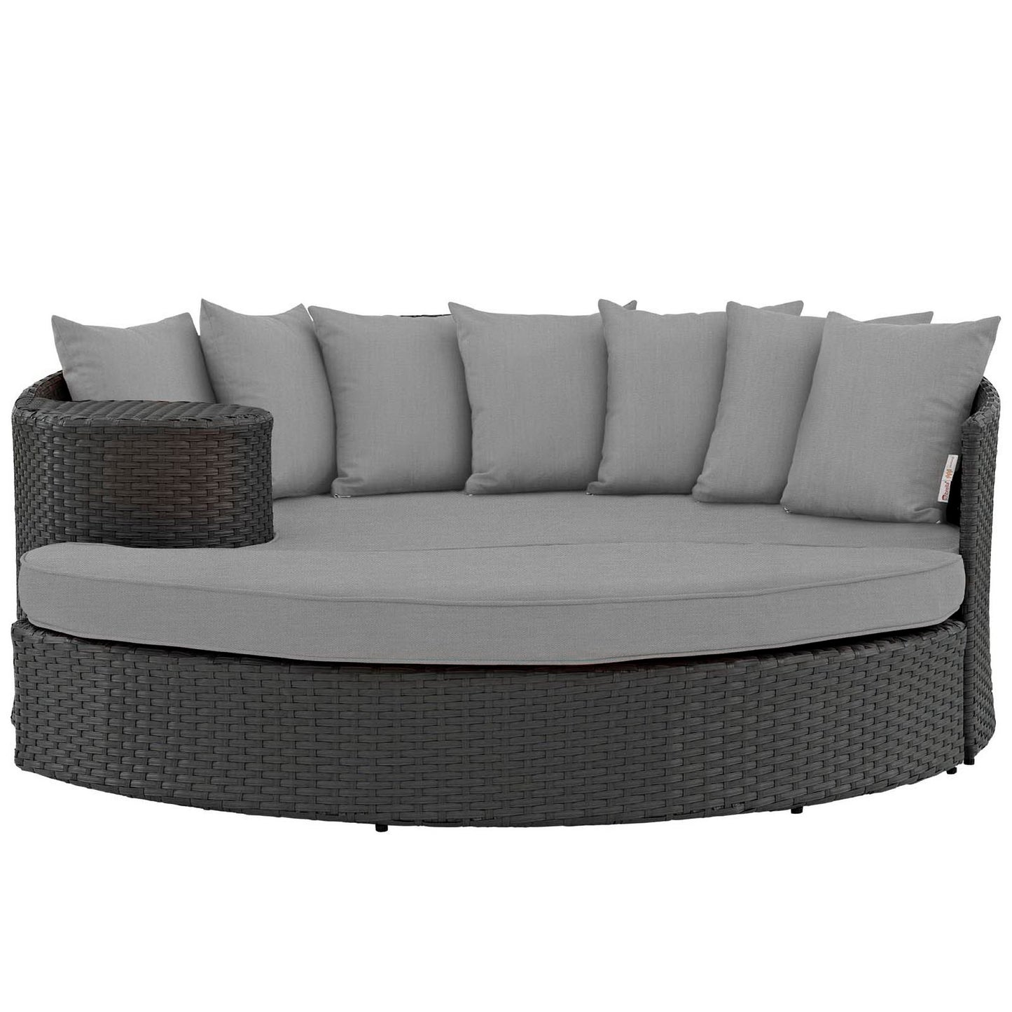 Round dark wicker outdoor daybed with light gray cushions and back pillows in a curved sectional style.