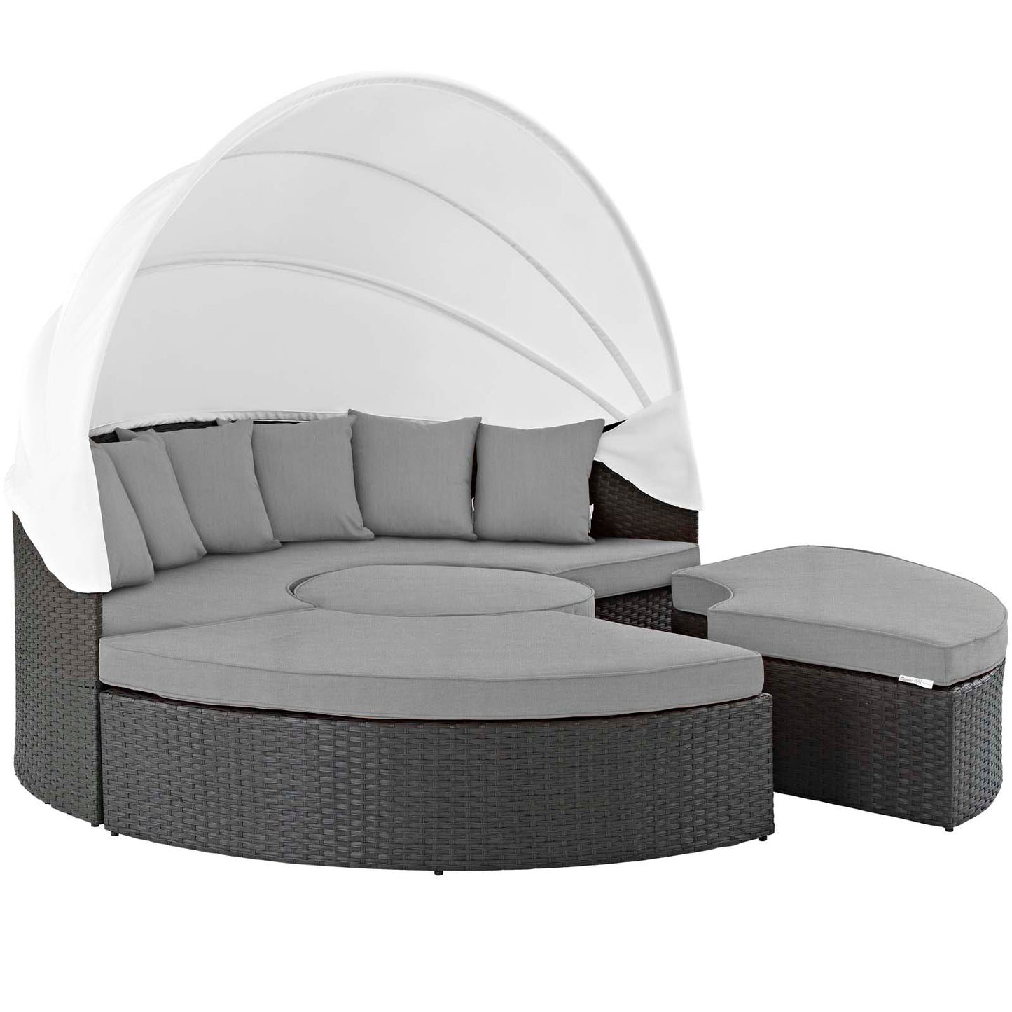 Round dark wicker outdoor daybed with white canopy and canvas gray cushions.