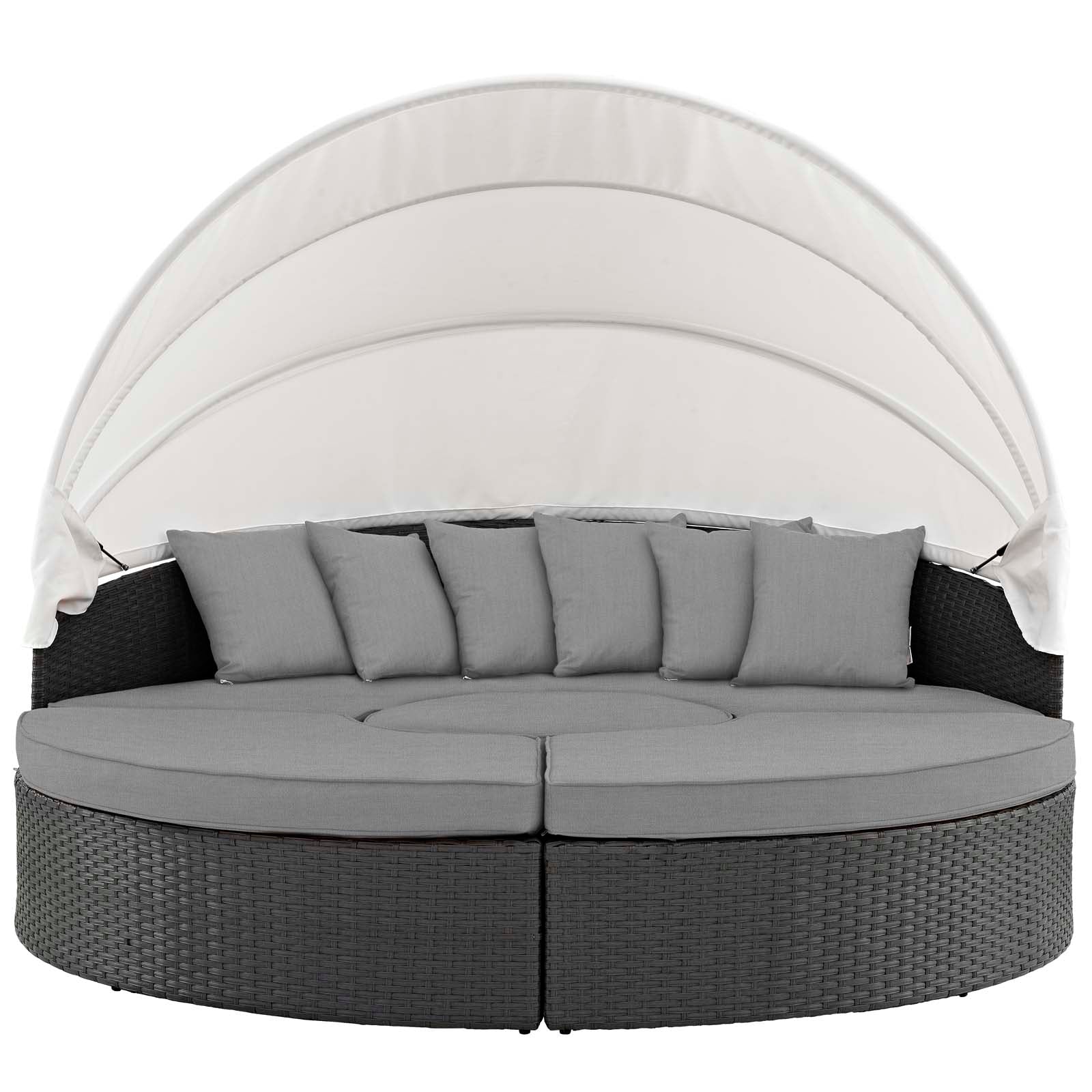 Round charcoal gray wicker outdoor daybed with white canopy and matching gray cushions.
