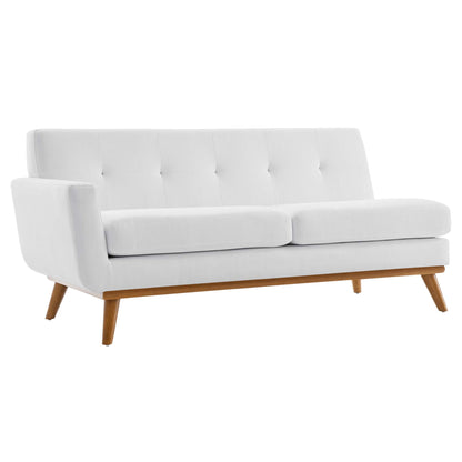 White fabric right-facing sectional sofa with tufted back, seat cushions, and angled wooden legs.