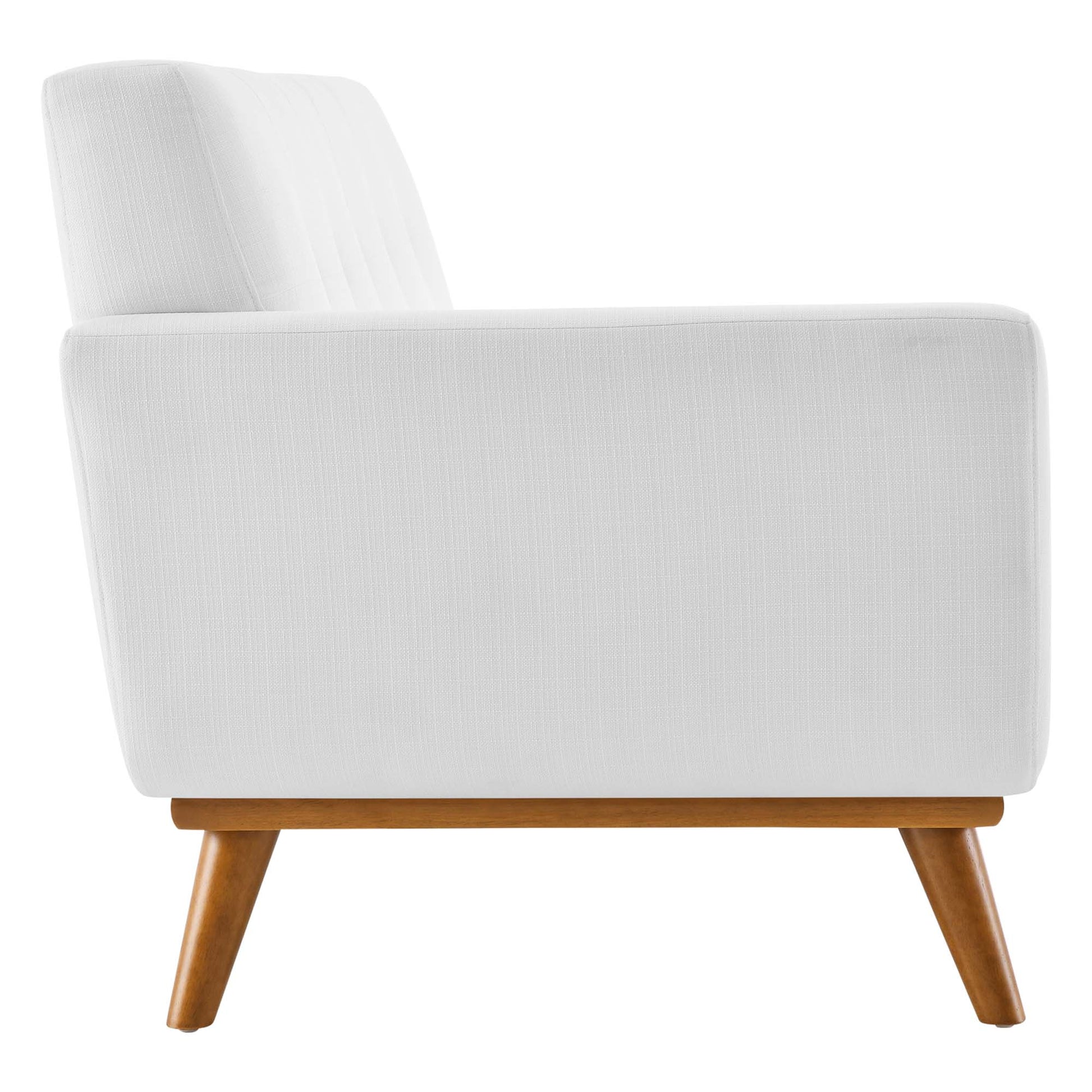 White fabric upholstered right-facing sectional sofa.