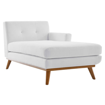 White fabric right-facing upholstered sectional sofa with chaise, tufted back, and tapered wood legs.