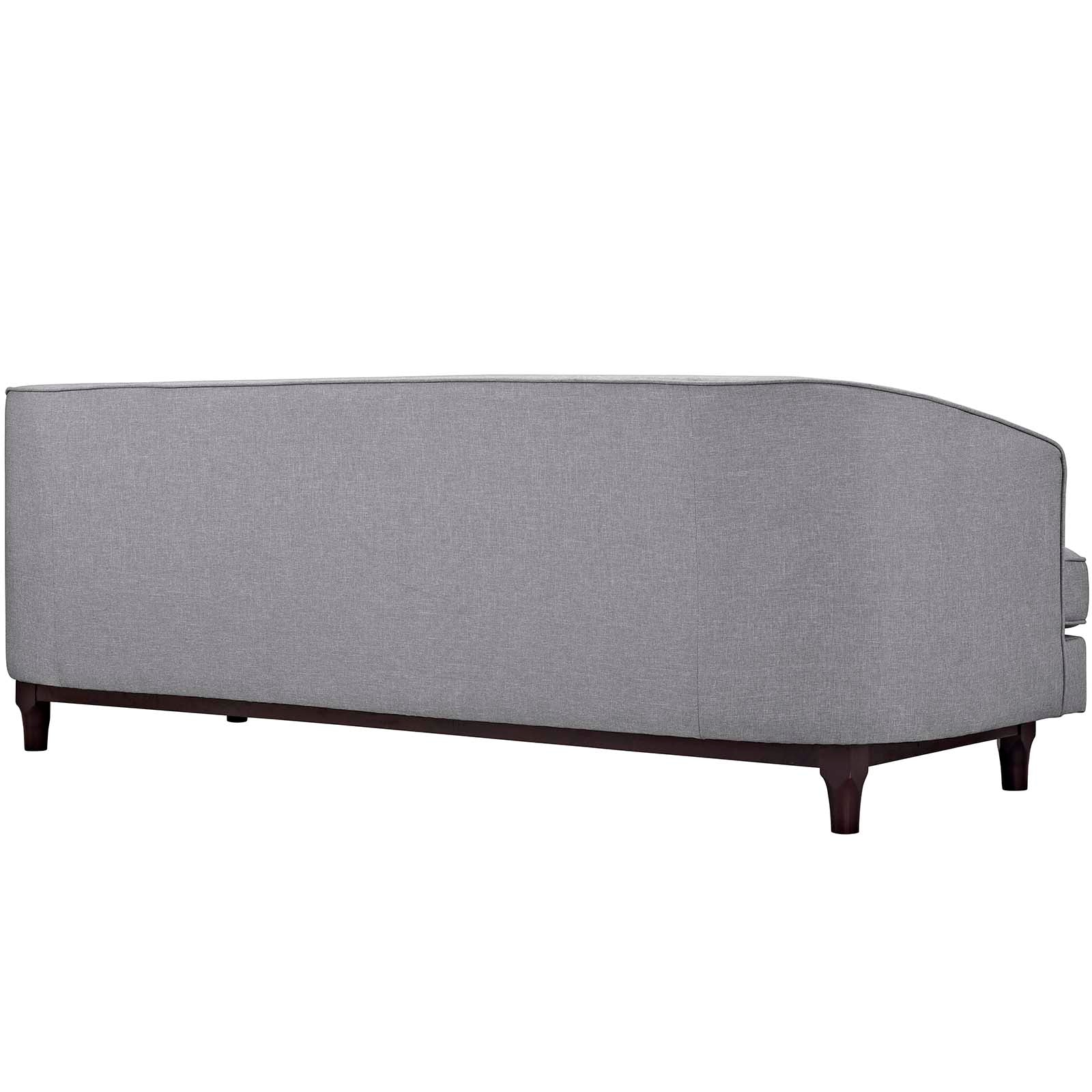 Gray fabric sofa with curved back, dark wood legs, mid-century modern living room seating