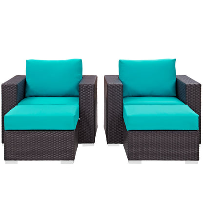 Four-piece dark brown wicker outdoor sectional set with turquoise cushions.