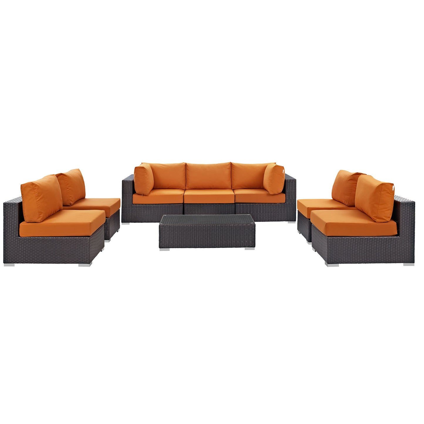 Outdoor wicker sectional with bright orange cushions and a matching rectangular coffee table.