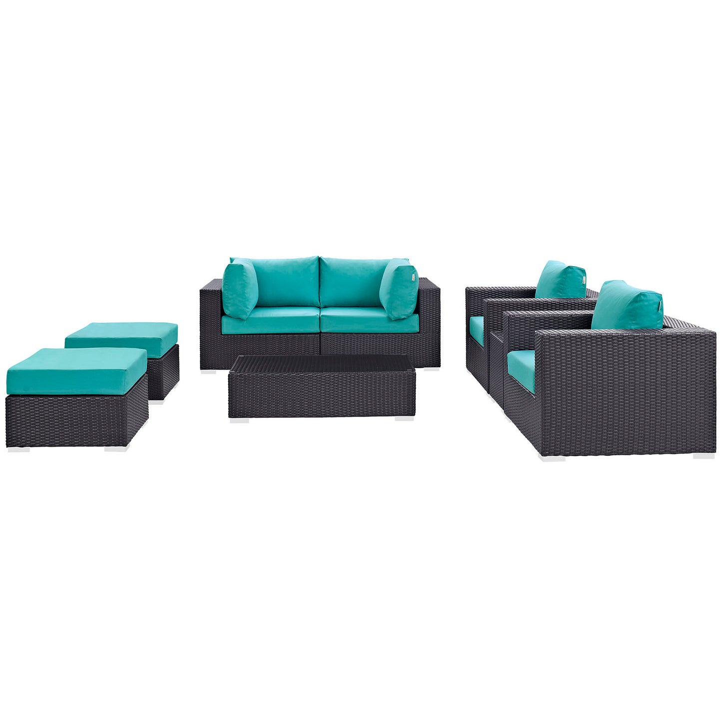 Turquoise cushions on dark synthetic wicker outdoor sectional with sofa, armchairs and ottomans, modern patio set.