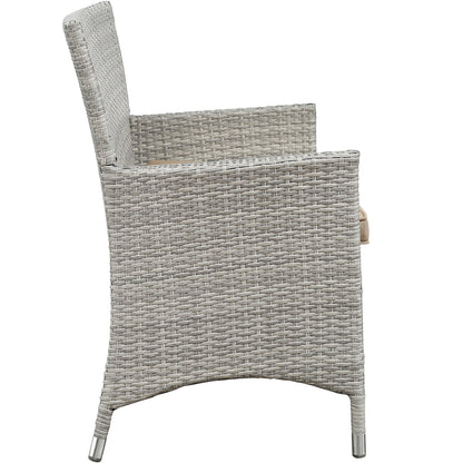 Light gray-beige woven rattan outdoor 4-piece patio conversation set with high-back chairs and metal-capped legs.