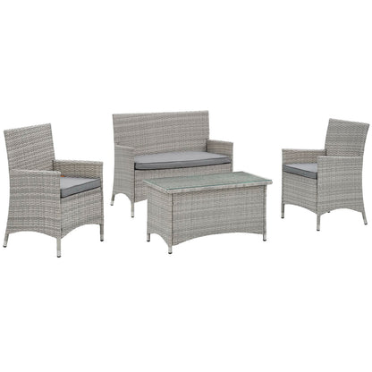 Gray wicker outdoor seating set with two armchairs, a loveseat, and glass-top coffee table with gray cushions.