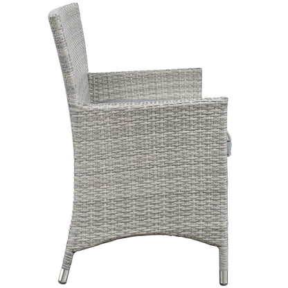 Light gray woven wicker outdoor conversation set with high-back chairs & a coffee table.