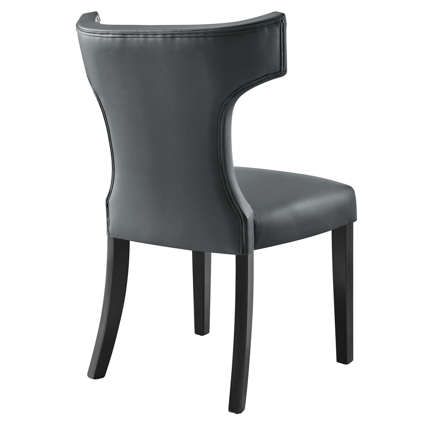 Gray faux-leather dining chair with curved back and tapered dark wood legs.