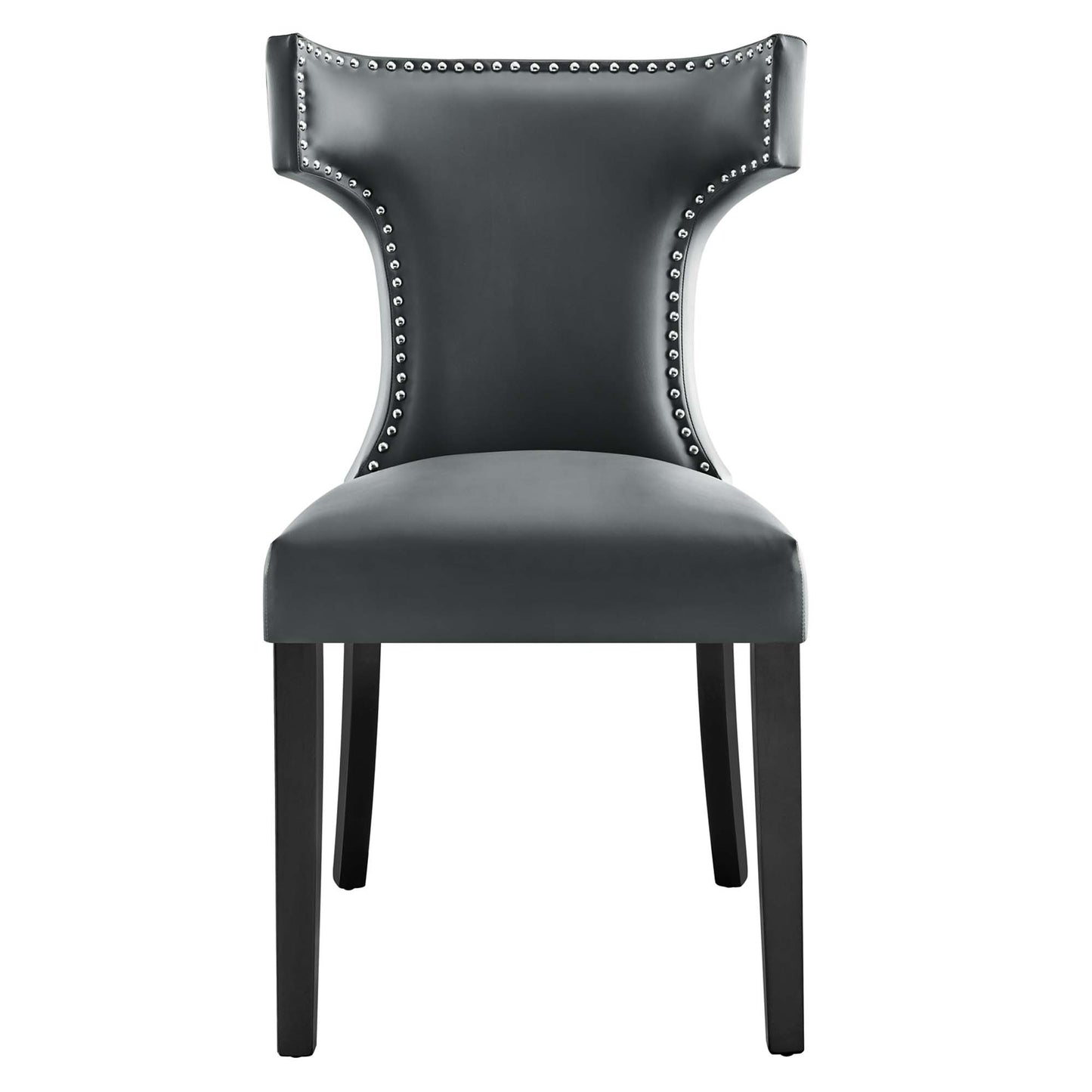 Gray faux-leather dining chair with curved wingback, studded nailhead trim, and black wooden legs.