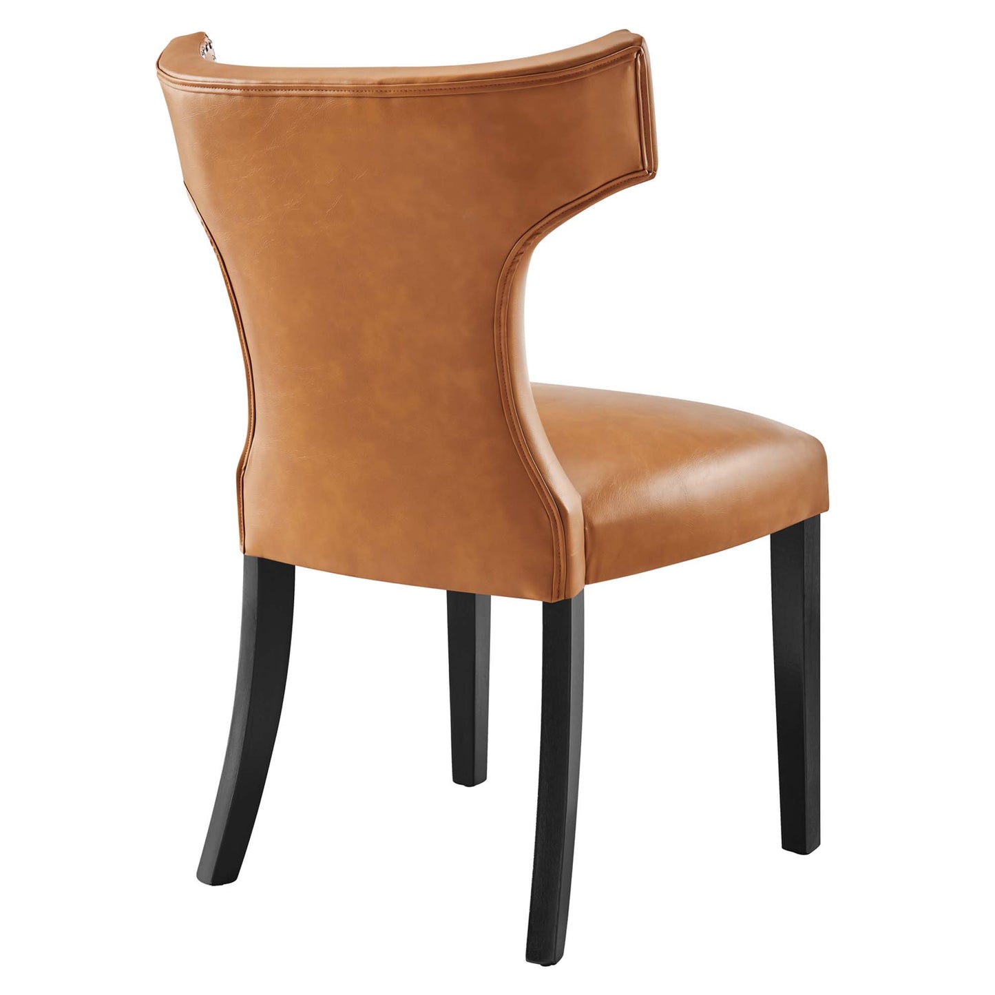 Tan vegan leather upholstered dining chair with curved back and black wooden legs.