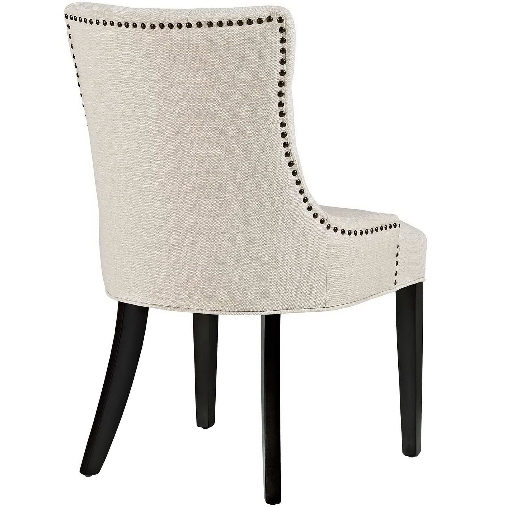 Beige fabric dining chair with curved back, dark wood legs, and nailhead trim along the edges.