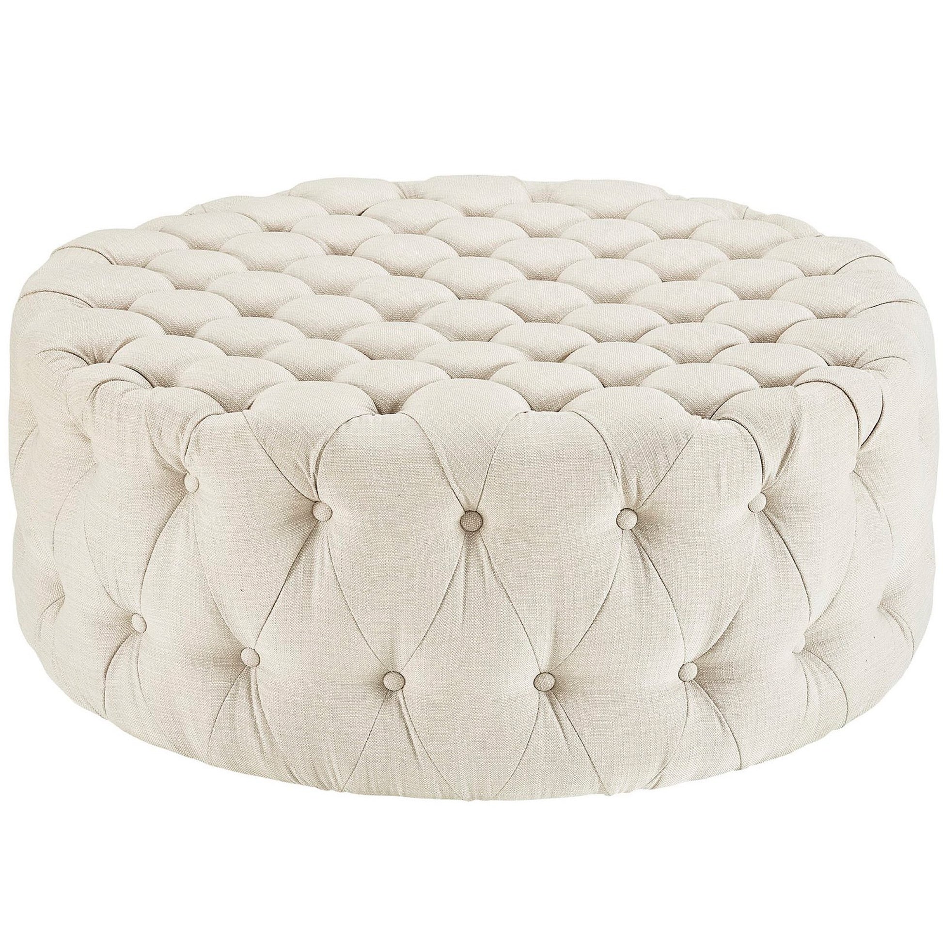 Beige round tufted pouf ottoman in linen fabric with button tufting.