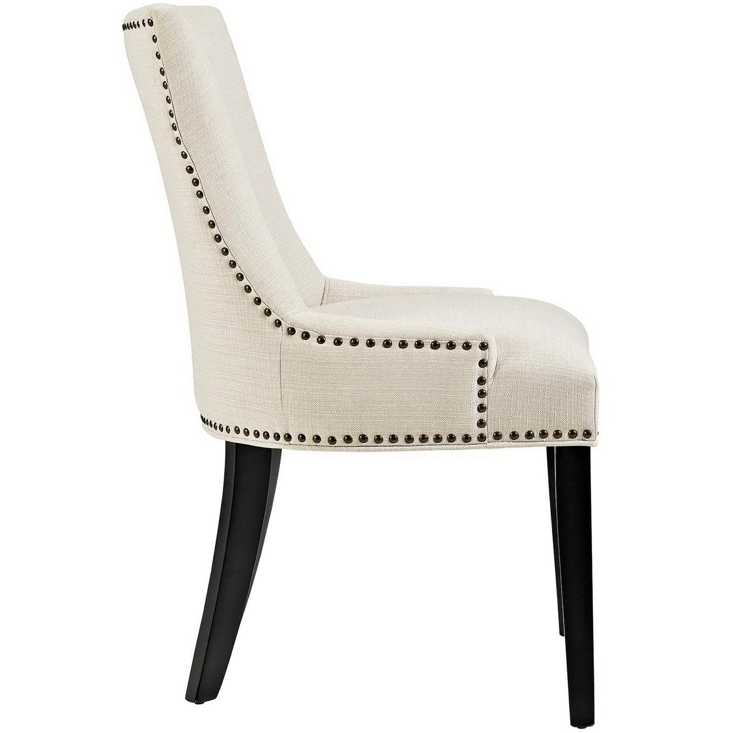 Beige curved-back fabric dining chair with nailhead trim along edges and black wooden legs.