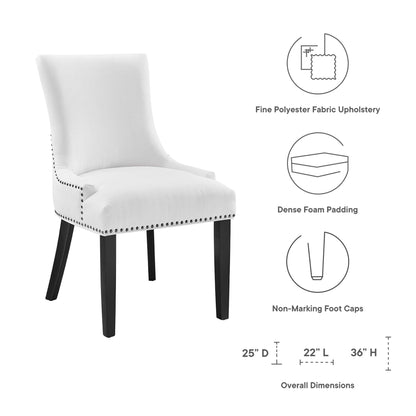 White upholstered dining chair with dark wood legs, nailhead trim, dense foam padding.