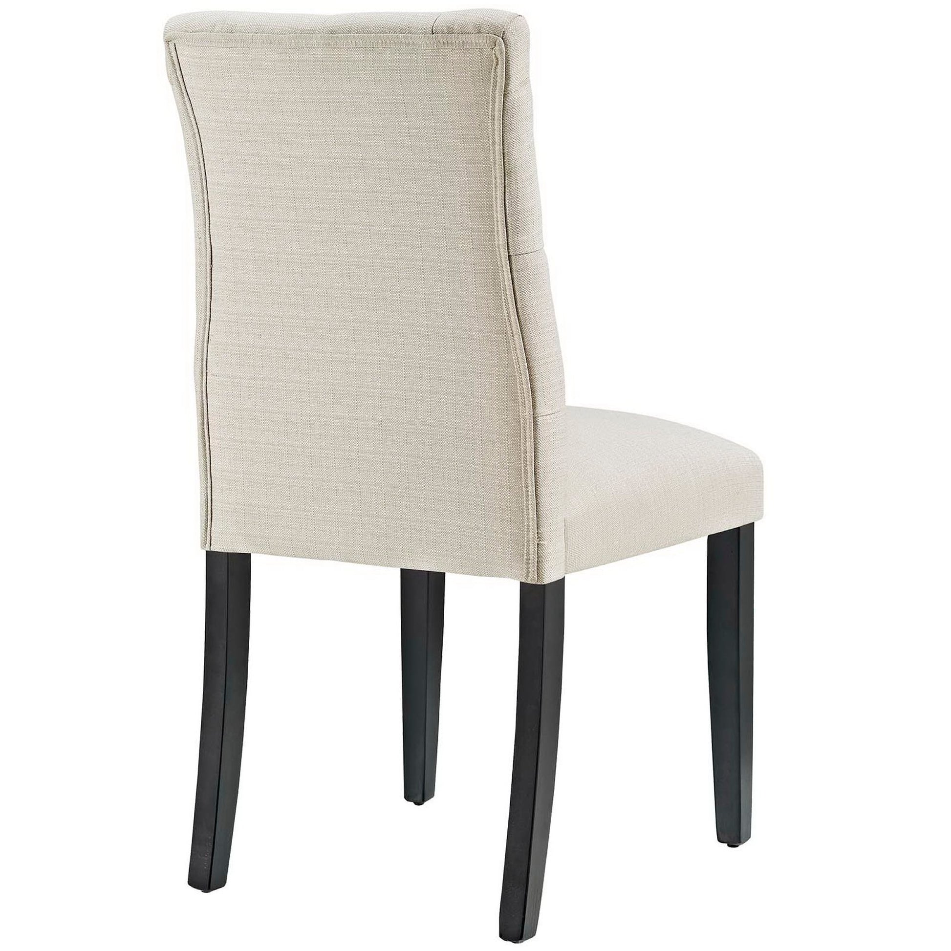 Beige fabric upholstered dining chair with a tall curved back and button-tufted detailing, dark wood legs.
