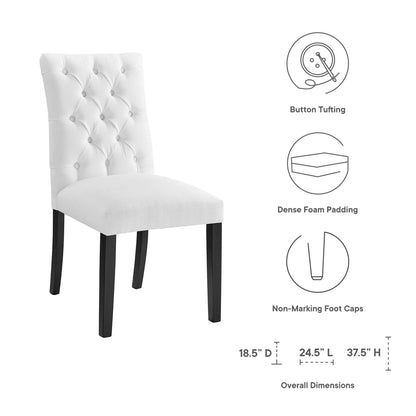 White tufted dining chair with dark wood legs, dense foam padding, and non-marking foot caps.