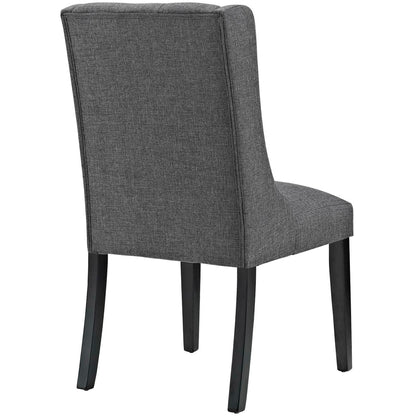 Gray fabric dining chair with high back, armless design, and dark tapered wooden legs.