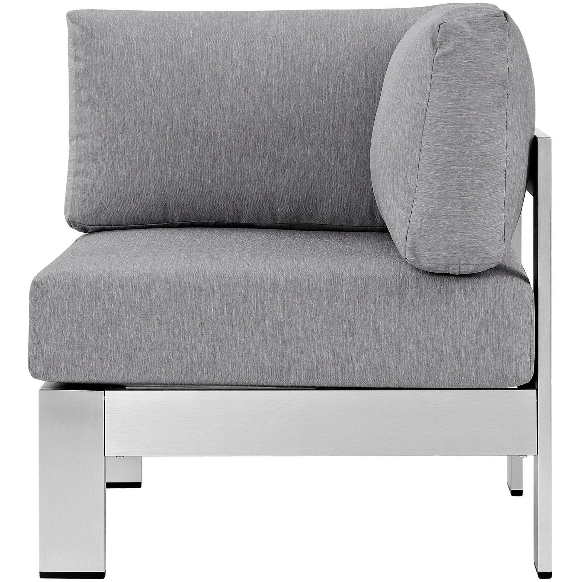 Gray outdoor aluminum corner sofa with cushioned seats and backs; modular sectional.