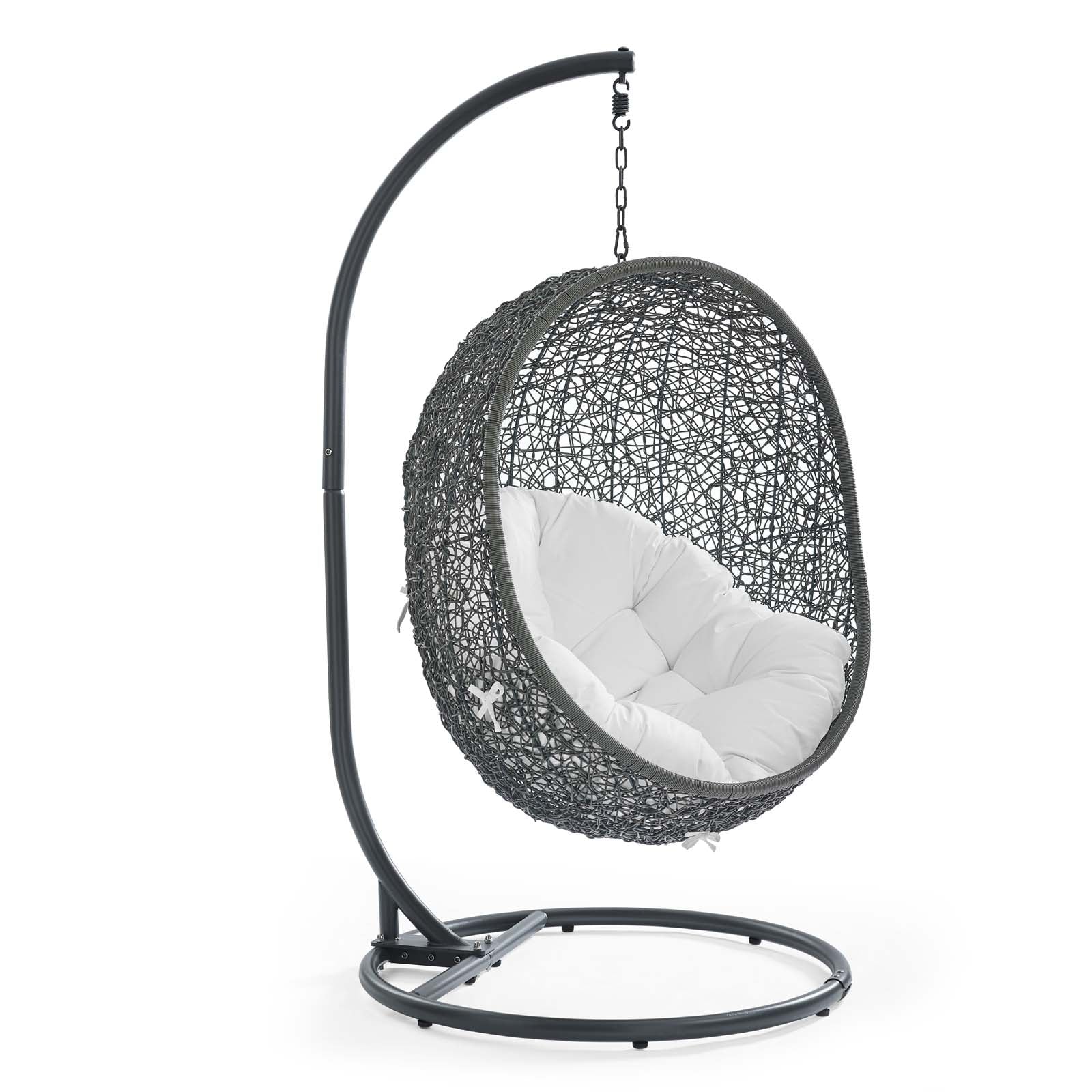 Gray woven egg chair with white cushion hanging from black curved metal stand.