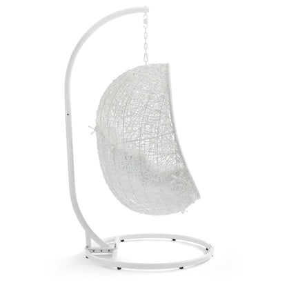White freestanding swing chair with woven lattice seat, curved metal frame, chain suspension, circular base.