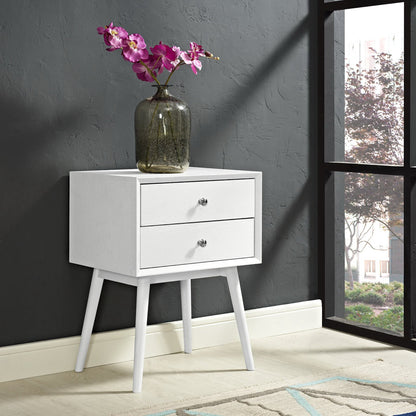 White two-drawer mid-century nightstand with tapered legs, topped by a dark green glass vase with pink orchids.