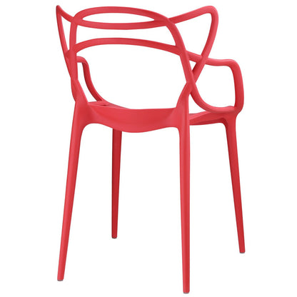 Pair of red plastic molded chairs with sculptural curved backs and slender legs.