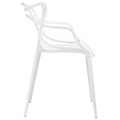 Pair of white molded plastic dining chairs with curved backrests and integrated armrests for outdoor dining.