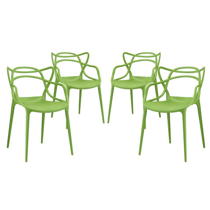 Four lime-green molded plastic dining chairs with sculptural looped backrests and slender legs.
