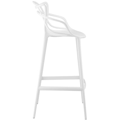 White plastic bar stools (set of 4) with rounded seats, sculpted backs, slim legs, and built-in footrests.