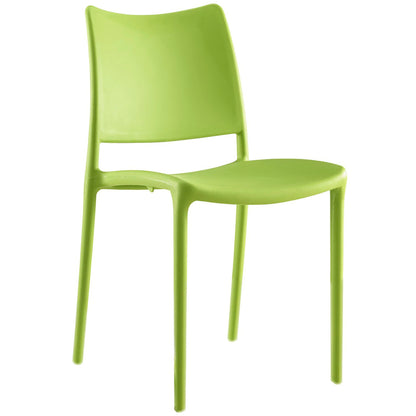 Lime green molded plastic dining chair with curved back and slender legs; contemporary design.