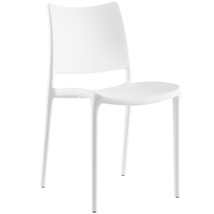 White molded plastic dining chair with curved backrest & slender legs, contemporary style.