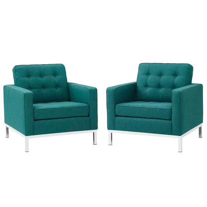 Pair of teal fabric armchairs with tufted backs, square arms and chrome legs.