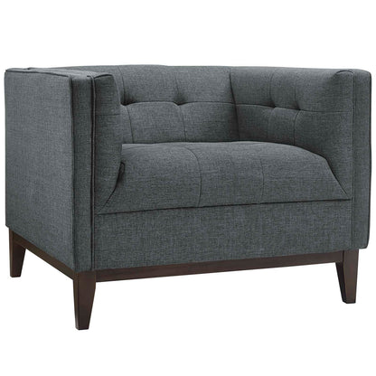 Gray fabric upholstered armchairs with tufted backs and seats, dark wood legs.